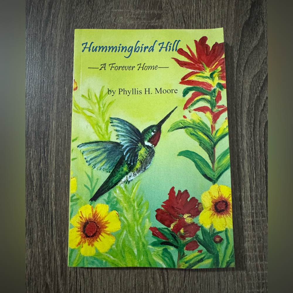 Book “Hummingbird Hill - A Forever Home" by Phyllis H. Moore.